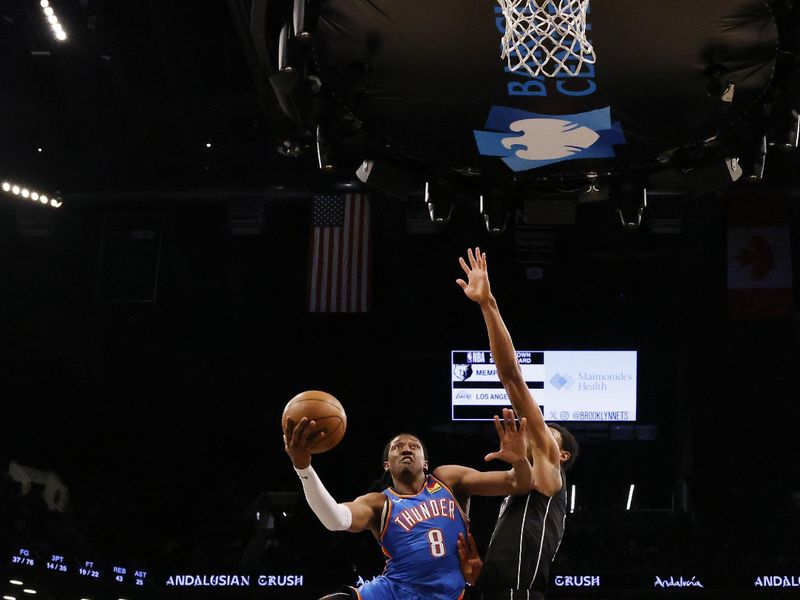 NEW YORK, NEW YORK - JANUARY 05:  Jalen Williams #8 of the Oklahoma City Thunder shoots against the Brooklyn Nets during their game at Barclays Center on January 05, 2024 in New York City.  User expressly acknowledges and agrees that, by downloading and or using this photograph, User is consenting to the terms and conditions of the Getty Images License Agreement.   (Photo by Al Bello/Getty Images)