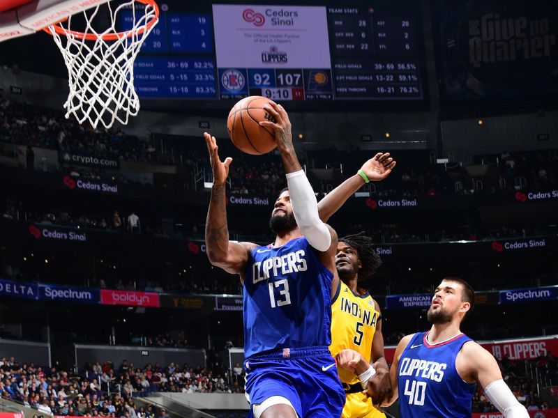 LOS ANGELES, CA - MARCH 25: Paul George #13 of the LA Clippers drives to the basket during the game against the Indiana Pacers on March 25, 2024 at Crypto.Com Arena in Los Angeles, California. NOTE TO USER: User expressly acknowledges and agrees that, by downloading and/or using this Photograph, user is consenting to the terms and conditions of the Getty Images License Agreement. Mandatory Copyright Notice: Copyright 2024 NBAE (Photo by Adam Pantozzi/NBAE via Getty Images)