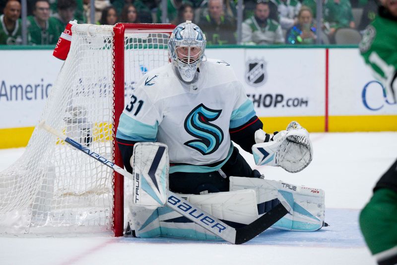 May 15, 2023; Dallas, Texas, USA; Seattle Kraken goaltender Philipp Grubauer (31) faces the Dallas Stars attack in the Seattle zone during the second period in game seven of the second round of the 2023 Stanley Cup Playoffs at the American Airlines Center. Mandatory Credit: Jerome Miron-USA TODAY Sports