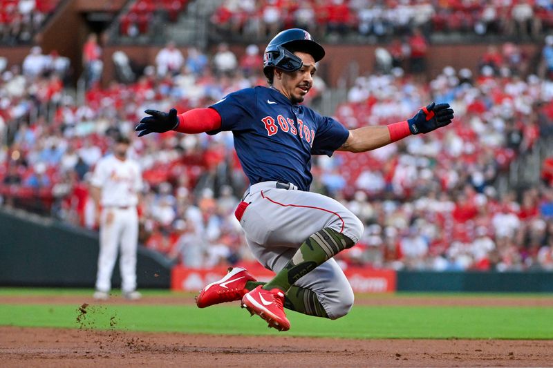 May 17, 2024; St. Louis, Missouri, USA;  Boston Red Sox shortstop David Hamilton (70) slides in at third after hitting a two run triple against the St. Louis Cardinals during the second inning at Busch Stadium. Mandatory Credit: Jeff Curry-USA TODAY Sports