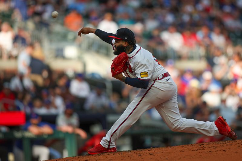 Sep 30, 2024; Atlanta, Georgia, USA; Atlanta Braves relief pitcher Daysbel Hernandez (62) throws against the New York Mets in the fifth inning at Truist Park. Mandatory Credit: Brett Davis-Imagn Images
