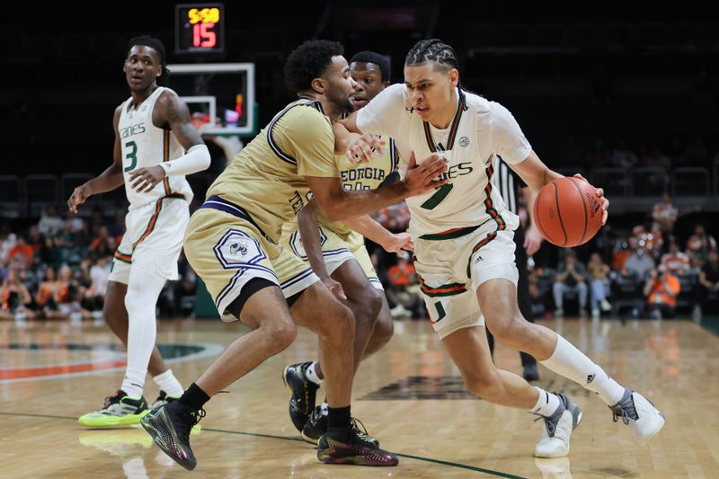 Feb 24, 2024; Coral Gables, Florida, USA; Miami Hurricanes guard Kyshawn George (7) drives to the basket against Georgia Tech Yellow Jackets guard Kyle Sturdivant (1) during the second half at Watsco Center. Mandatory Credit: Sam Navarro-USA TODAY Sports