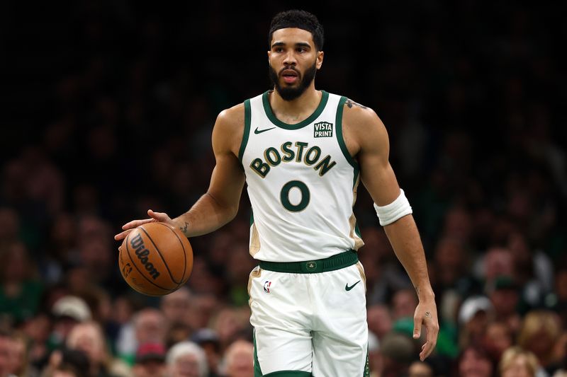 BOSTON, MASSACHUSETTS - NOVEMBER 10: Jayson Tatum #0 of the Boston Celtics dribbles against the Brooklyn Nets  during the first quarter of their In-Season Tournament game at TD Garden on November 10, 2023 in Boston, Massachusetts. NOTE TO USER: User expressly acknowledges and agrees that, by downloading and or using this photograph, User is consenting to the terms and conditions of the Getty Images License Agreement. (Photo by Maddie Meyer/Getty Images)