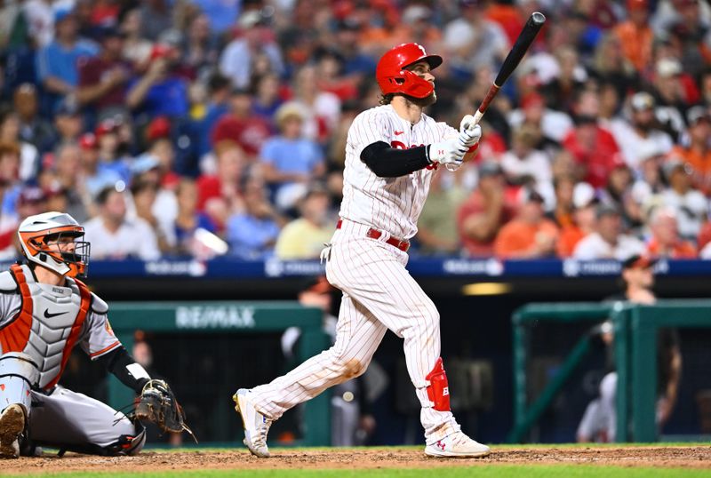 Jul 25, 2023; Philadelphia, Pennsylvania, USA; Philadelphia Phillies first baseman Bryce Harper (3) hits a home run against the Baltimore Orioles in the sixth inning at Citizens Bank Park. Mandatory Credit: Kyle Ross-USA TODAY Sports