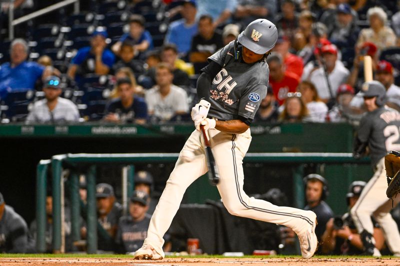 Sep 9, 2023; Washington, District of Columbia, USA; Washington Nationals shortstop CJ Abrams (5) triples against the Los Angeles Dodgers during the first inning at Nationals Park. Mandatory Credit: Brad Mills-USA TODAY Sports