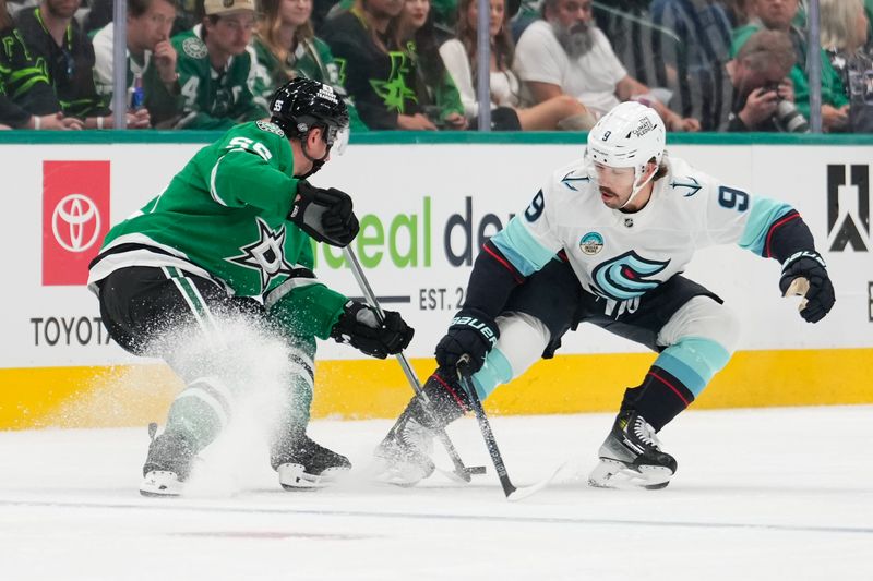 Oct 13, 2024; Dallas, Texas, USA;  Dallas Stars defenseman Thomas Harley (55) looks to pass against Seattle Kraken center Chandler Stephenson (9) during the first period at American Airlines Center. Mandatory Credit: Chris Jones-Imagn Images