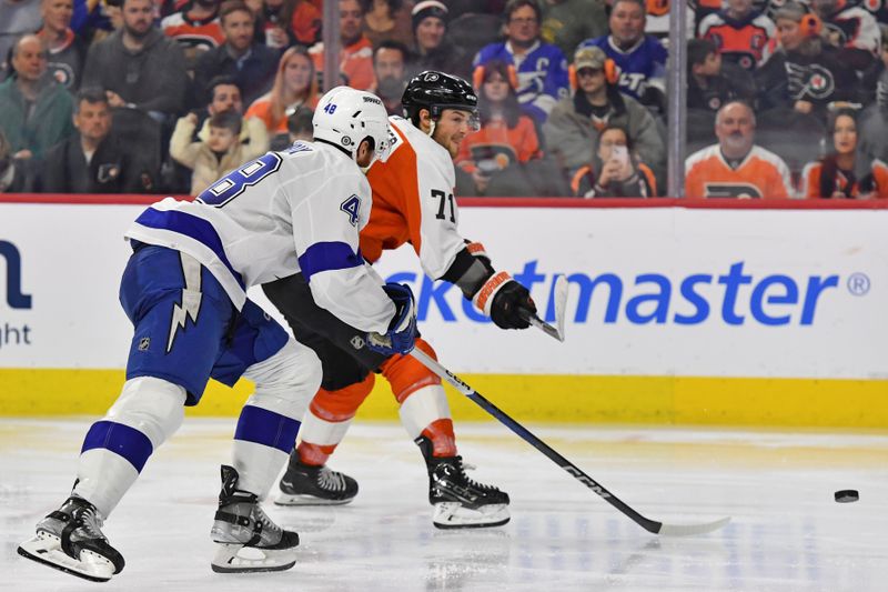 Feb 27, 2024; Philadelphia, Pennsylvania, USA; Philadelphia Flyers right wing Tyson Foerster (71) scores a goal while being defended by Tampa Bay Lightning defenseman Nick Perbix (48) during the third period at Wells Fargo Center. Mandatory Credit: Eric Hartline-USA TODAY Sports