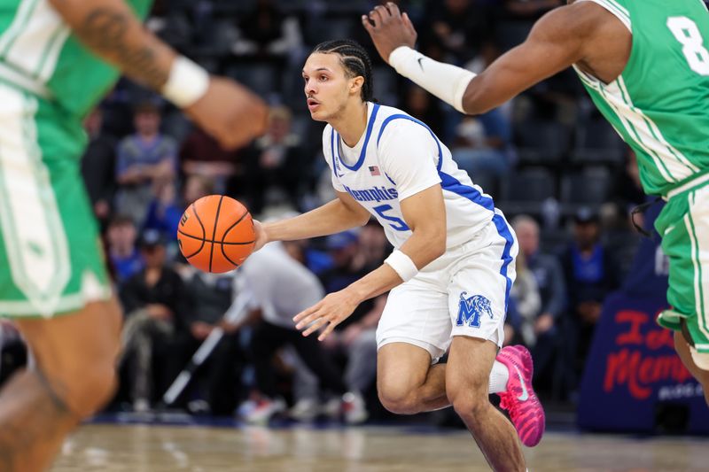 Dec 31, 2025; Memphis, Tennessee, USA; Memphis Tigers guard Curtis Givens III (5) handles the ball against the North Texas Mean Green during the first half at FedExForum. Mandatory Credit: Wesley Hale-Imagn Images