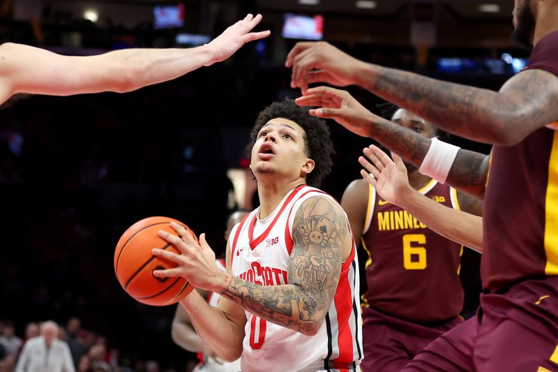 Jan 20, 2026; Columbus, Ohio, USA;  Ohio State Buckeyes guard John Mobley Jr. (0) goes to the basket during overtime against the Minnesota Golden Gophers at Value City Arena. Mandatory Credit: Joseph Maiorana-Imagn Images