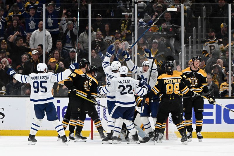 Feb 25, 2025; Boston, Massachusetts, USA; Toronto Maple Leafs right wing Pontus Holmberg (29) celebrates after scoring a goal against the Boston Bruins during the third period at the TD Garden. Mandatory Credit: Brian Fluharty-Imagn Images