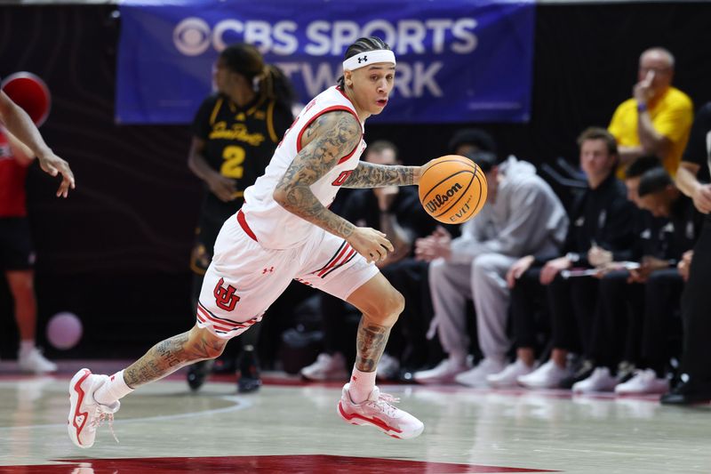 Feb 4, 2026; Salt Lake City, Utah, USA; Utah Utes guard Terrence Brown (2) advances the ball against the Arizona State Sun Devils during the second half at Jon M. Huntsman Center. Mandatory Credit: Rob Gray-Imagn Images