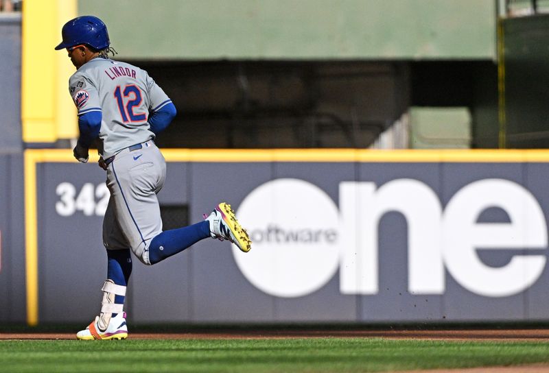 Sep 29, 2024; Milwaukee, Wisconsin, USA;New York Mets shortstop Francisco Lindor (12) rounds the bases after hitting a home run against the Milwaukee Brewers in the sixth inning at American Family Field. Mandatory Credit: Michael McLoone-Imagn Images