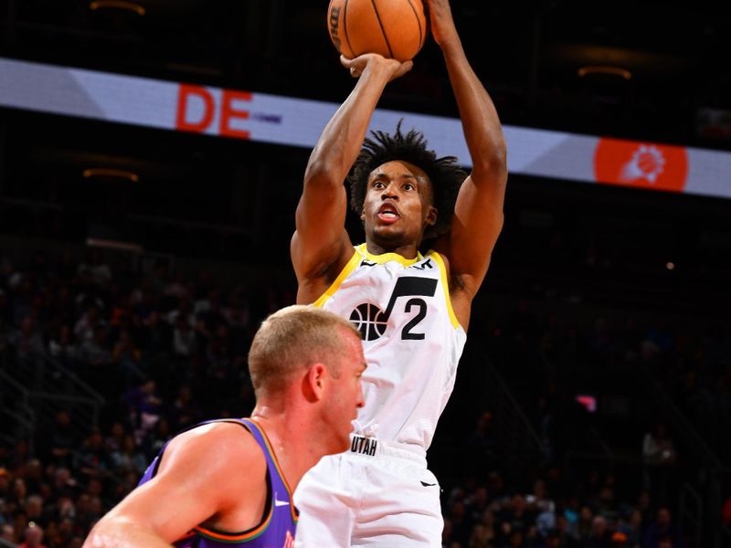 PHOENIX, AZ - JANUARY 11: Collin Sexton #2 of the Utah Jazz shoots the ball during the game against the Phoenix Suns on January 11, 2025 at Footprint Center in Phoenix, Arizona. NOTE TO USER: User expressly acknowledges and agrees that, by downloading and or using this photograph, user is consenting to the terms and conditions of the Getty Images License Agreement. Mandatory Copyright Notice: Copyright 2025 NBAE (Photo by Barry Gossage/NBAE via Getty Images)