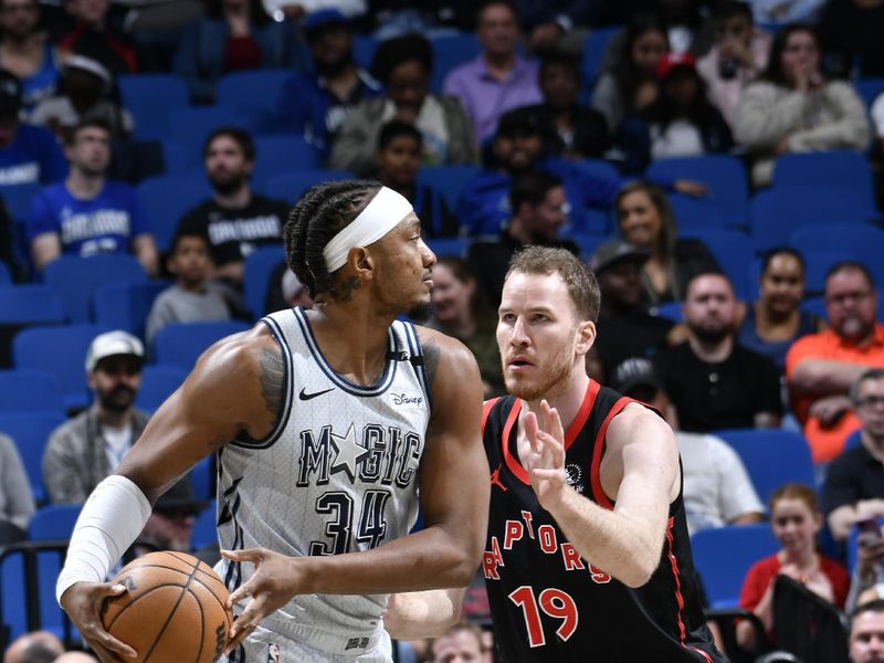 ORLANDO, FL - MARCH 4:  Wendell Carter Jr. #34 of the Orlando Magic handles the ball during the game against the Toronto Raptors on March 4, 2025 at Kia Center in Orlando, Florida. NOTE TO USER: User expressly acknowledges and agrees that, by downloading and or using this photograph, User is consenting to the terms and conditions of the Getty Images License Agreement. Mandatory Copyright Notice: Copyright 2025 NBAE (Photo by Fernando Medina/NBAE via Getty Images)