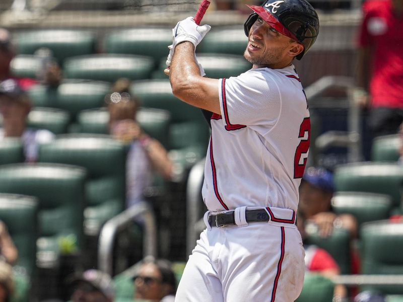 Jul 20, 2023; Cumberland, Georgia, USA; Atlanta Braves first baseman Matt Olson (28) hits a home run against the Arizona Diamondbacks during the seventh inning at Truist Park. Mandatory Credit: Dale Zanine-USA TODAY Sports