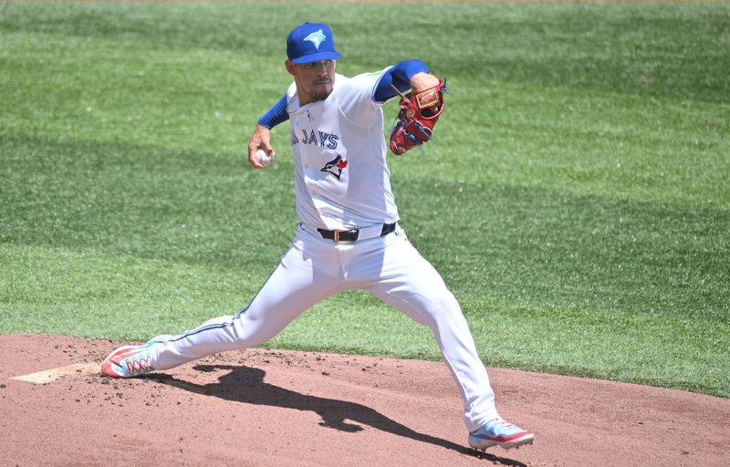 JJun 16, 2024; Toronto, Ontario, CAN;  Toronto Blue Jays starting pitcher Jose Berrios (17) delivers a pitch against the Cleveland Indians in the first inning at Rogers Centre. Mandatory Credit: Dan Hamilton-USA TODAY Sports