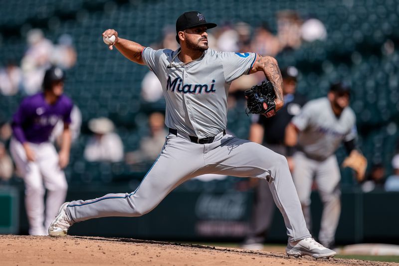 Aug 29, 2024; Denver, Colorado, USA; Miami Marlins relief pitcher Jesus Tinoco (38) pitches in the sixth inning against the Colorado Rockies at Coors Field. Mandatory Credit: Isaiah J. Downing-USA TODAY Sports