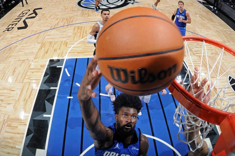 ORLANDO, FL - FEBRUARY 8: Jonathan Isaac #1 of the Orlando Magic drives to the basket during the game against the San Antonio Spurs on February 8, 2024 at the Kia Center in Orlando, Florida. NOTE TO USER: User expressly acknowledges and agrees that, by downloading and or using this photograph, User is consenting to the terms and conditions of the Getty Images License Agreement. Mandatory Copyright Notice: Copyright 2024 NBAE (Photo by Fernando Medina/NBAE via Getty Images)