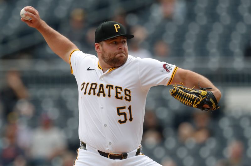 Apr 9, 2024; Pittsburgh, Pennsylvania, USA;  Pittsburgh Pirates relief pitcher David Bednar (51) throws against the Detroit Tigers during the ninth inning at PNC Park. Detroit won 5-3. Mandatory Credit: Charles LeClaire-USA TODAY Sports