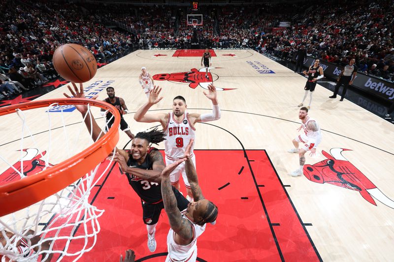 CHICAGO, IL - MARCH 18:  Jabari Walker #34 of the Portland Trail Blazers drives to the basket during the game against the Chicago Bulls on March 18, 2024 at United Center in Chicago, Illinois. NOTE TO USER: User expressly acknowledges and agrees that, by downloading and or using this photograph, User is consenting to the terms and conditions of the Getty Images License Agreement. Mandatory Copyright Notice: Copyright 2024 NBAE (Photo by Jeff Haynes/NBAE via Getty Images)