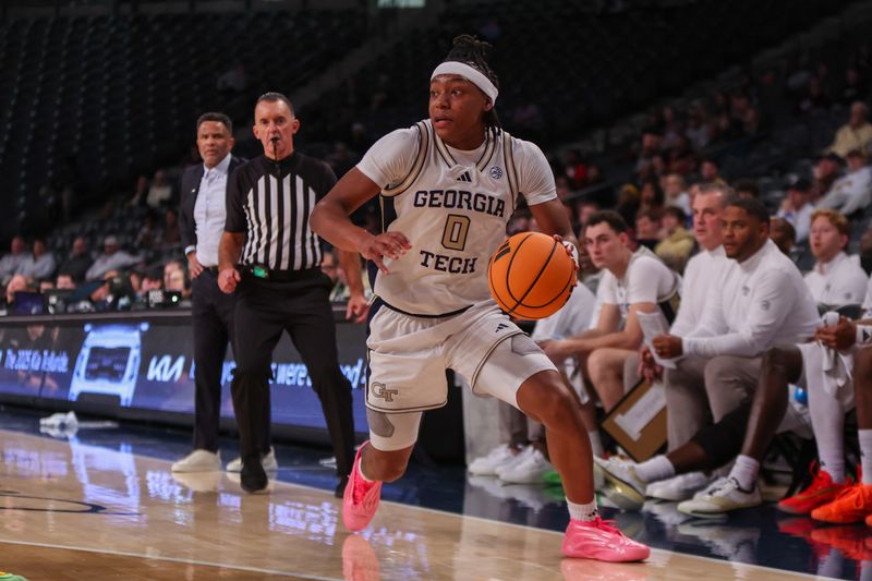 Dec 3, 2025; Atlanta, Georgia, USA; Georgia Tech Yellow Jackets guard Akai Fleming (0) drives to the basket against the Mississippi State Bulldogs in the second half at McCamish Pavilion. Mandatory Credit: Brett Davis-Imagn Images