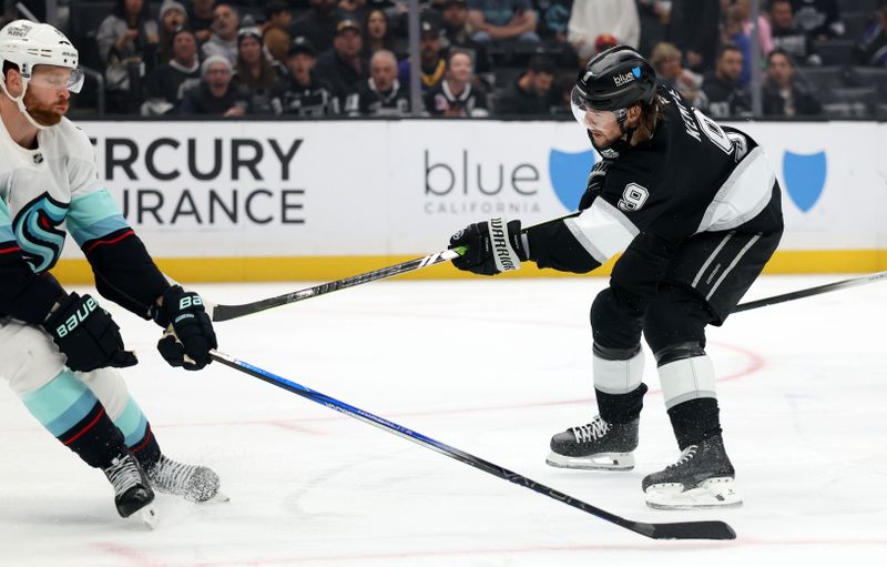 Nov 23, 2024; Los Angeles, California, USA;  Los Angeles Kings right wing Adrian Kempe (9) scores a goal during the second period against the Seattle Kraken at Crypto.com Arena. Mandatory Credit: Kiyoshi Mio-Imagn Images