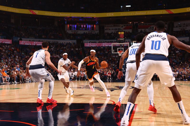 OKLAHOMA CITY, OK - APRIL 14: Shai Gilgeous-Alexander #2 of the Oklahoma City Thunder dribbles the ball during the game against the Dallas Mavericks  on April 14, 2024 at Paycom Arena in Oklahoma City, Oklahoma. NOTE TO USER: User expressly acknowledges and agrees that, by downloading and or using this photograph, User is consenting to the terms and conditions of the Getty Images License Agreement. Mandatory Copyright Notice: Copyright 2024 NBAE (Photo by Zach Beeker/NBAE via Getty Images)