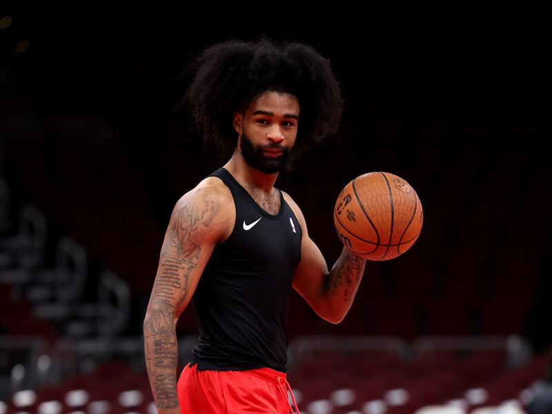 CHICAGO, ILLINOIS - NOVEMBER 29: Coby White #0 of the Chicago Bulls warms up before the game against the Boston Celtics in the Emirates NBA Cup at the United Center on November 29, 2024 in Chicago, Illinois. (Photo by Luke Hales/Getty Images)