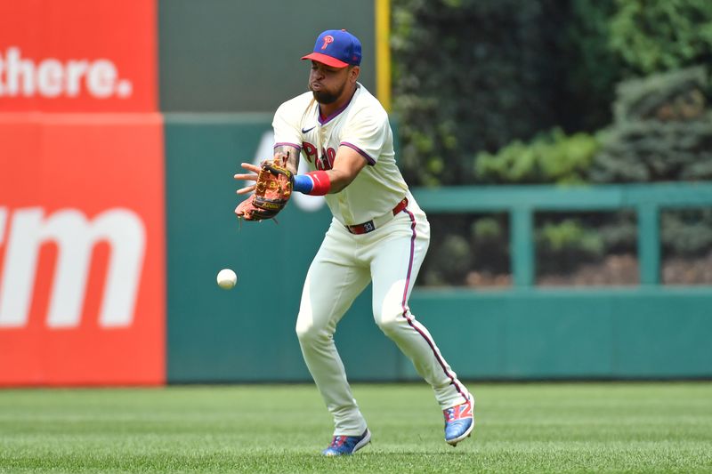 Jul 28, 2024; Philadelphia, Pennsylvania, USA; Philadelphia Phillies shortstop Edmundo Sosa (33) loses sight of the ball during infield fly rule against the Cleveland Guardians during the first inning at Citizens Bank Park. Mandatory Credit: Eric Hartline-USA TODAY Sports
