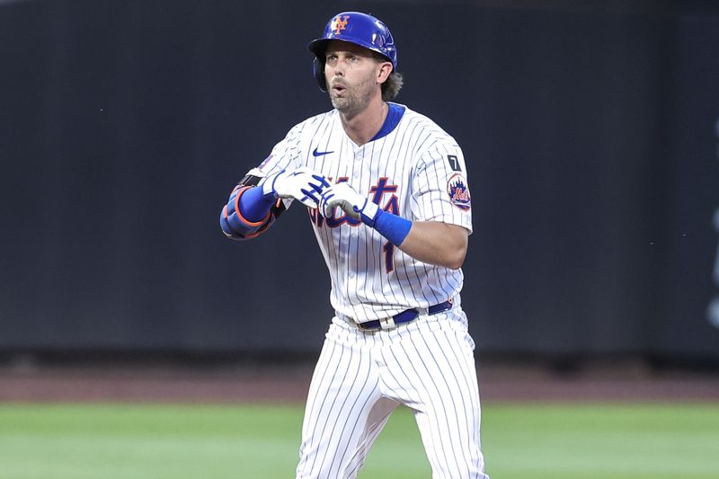 Jun 25, 2025; New York City, New York, USA;  New York Mets center fielder Jeff McNeil (1) gestures after hitting a double in the fourth inning against the Atlanta Braves at Citi Field. Mandatory Credit: Wendell Cruz-Imagn Images