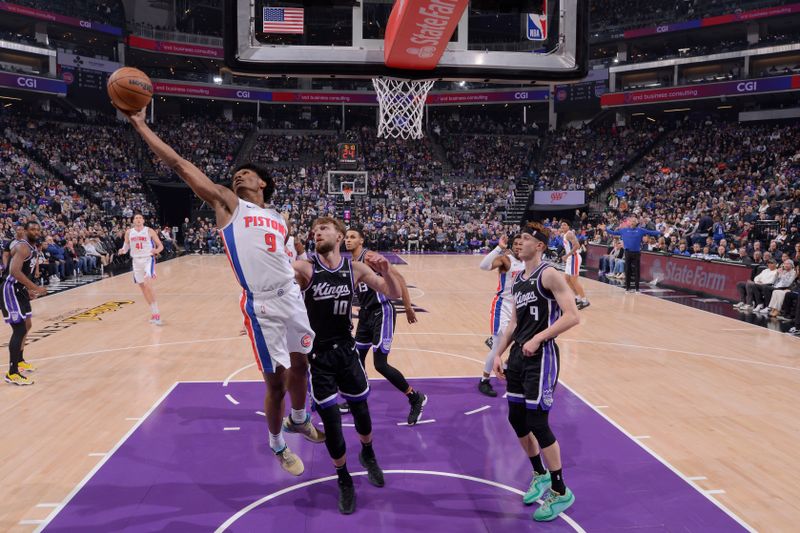 SACRAMENTO, CA - FEBRUARY 7: Ausar Thompson #9 of the Detroit Pistons rebounds the ball during the game against the Sacramento Kings on February 7, 2024 at Golden 1 Center in Sacramento, California. NOTE TO USER: User expressly acknowledges and agrees that, by downloading and or using this Photograph, user is consenting to the terms and conditions of the Getty Images License Agreement. Mandatory Copyright Notice: Copyright 2024 NBAE (Photo by Rocky Widner/NBAE via Getty Images)