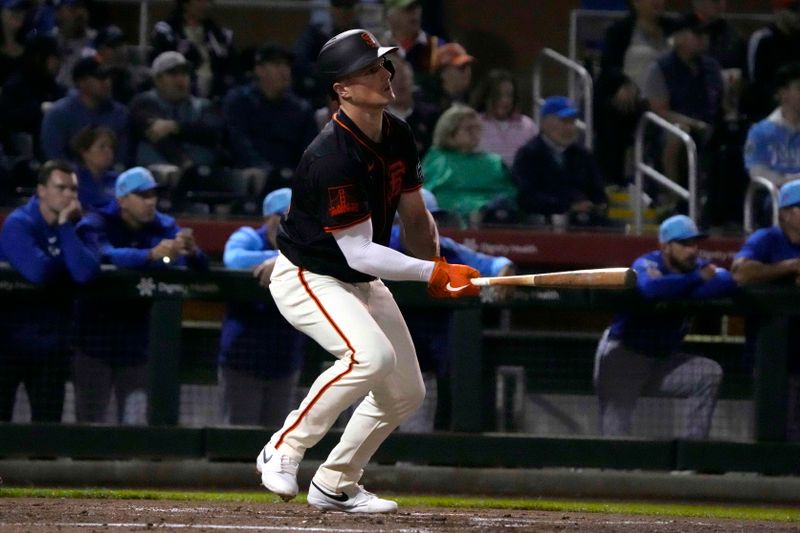 Mar 19, 2024; Scottsdale, Arizona, USA; San Francisco Giants third baseman Matt Chapman (26) hits against the Kansas City Royals in the first inning at Scottsdale Stadium. Mandatory Credit: Rick Scuteri-USA TODAY Sports