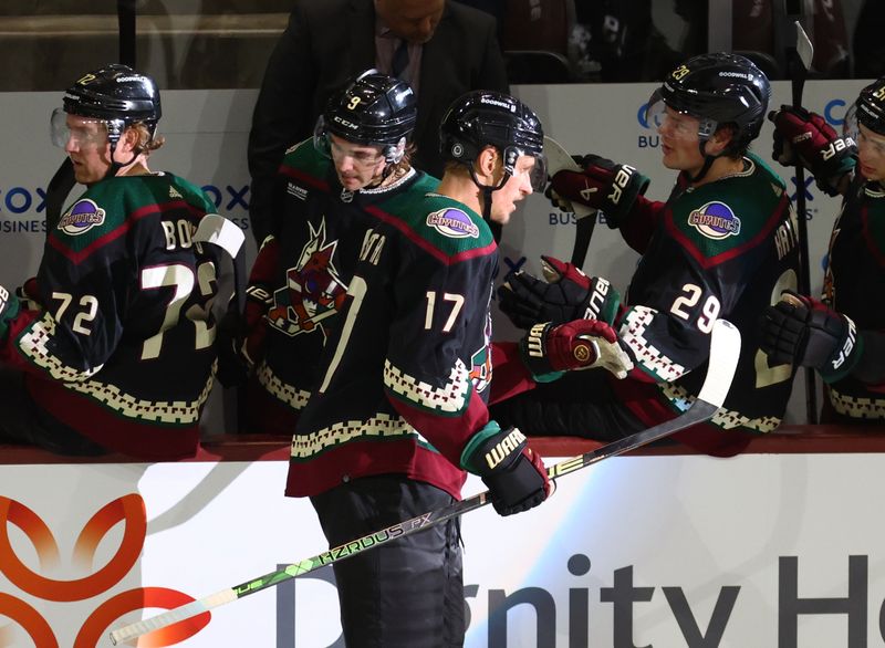 Jan 17, 2023; Tempe, Arizona, USA; Arizona Coyotes center Nick Bjugstad (17) celebrates a goal with teammates against the Detroit Red Wings in the second period at Mullett Arena. Mandatory Credit: Mark J. Rebilas-USA TODAY Sports