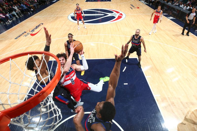 WASHINGTON, DC -? MARCH 29:  Deni Avdija #8 of the Washington Wizards goes to the basket during the game on March 29, 2024 at Capital One Arena in Washington, DC. NOTE TO USER: User expressly acknowledges and agrees that, by downloading and or using this Photograph, user is consenting to the terms and conditions of the Getty Images License Agreement. Mandatory Copyright Notice: Copyright 2024 NBAE (Photo by Stephen Gosling/NBAE via Getty Images)