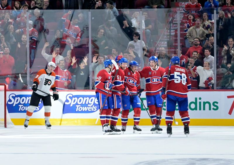 Sep 23, 2024; Montreal, Quebec, CAN; Montreal Canadiens forward Alex Barre-Boulet (27) celebrates with teammates after scoring a goal against the Philadelphia Flyers during the third period at the Bell Centre. Mandatory Credit: Eric Bolte-Imagn Images