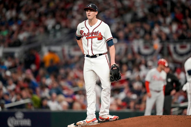 Oct 12, 2022; Atlanta, Georgia, USA; Atlanta Braves starting pitcher Kyle Wright (30) stands on the mound as he prepares to throw against the Philadelphia Phillies in the fifth inning during game two of the NLDS for the 2022 MLB Playoffs at Truist Park. Mandatory Credit: Dale Zanine-USA TODAY Sports