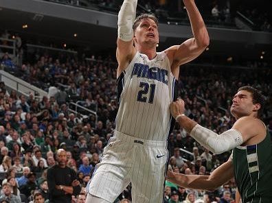 MILWAUKEE, WI - DECEMBER 21:  Moritz Wagner #21 of the Orlando Magic drives to the basket during the game against the Milwaukee Bucks on December 21, 2023 at the Fiserv Forum Center in Milwaukee, Wisconsin. NOTE TO USER: User expressly acknowledges and agrees that, by downloading and or using this Photograph, user is consenting to the terms and conditions of the Getty Images License Agreement. Mandatory Copyright Notice: Copyright 2023 NBAE (Photo by Gary Dineen/NBAE via Getty Images).