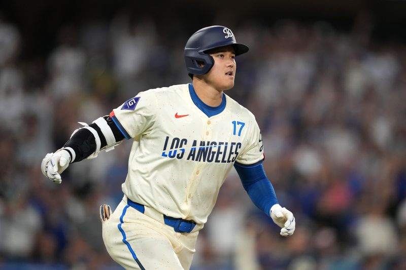 Aug 24, 2024; Los Angeles, California, USA; Los Angeles Dodgers designated hitter Shohei Ohtani (17) runs the bases after hitting a two-run home run in the fifth inning against the Tampa Bay Rays at Dodger Stadium. Mandatory Credit: Kirby Lee-USA TODAY Sports