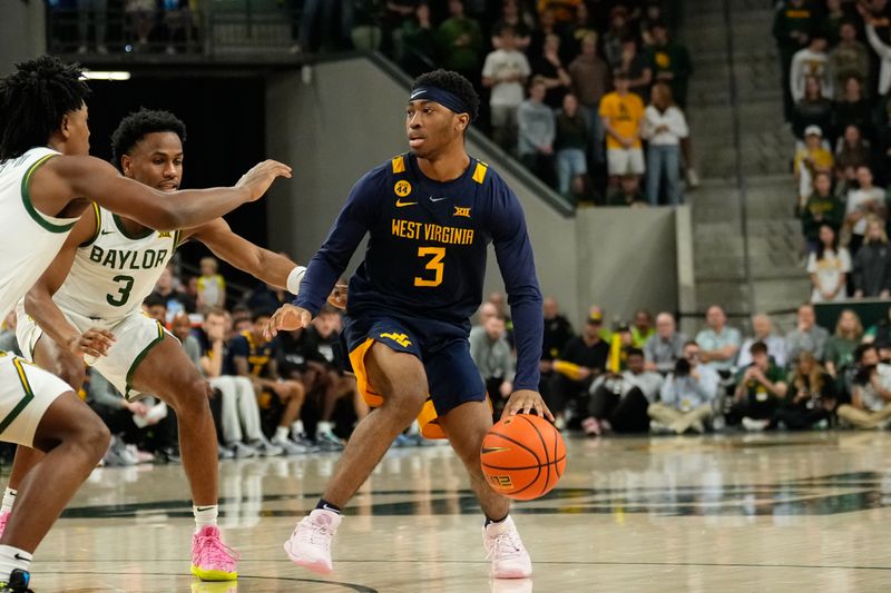 Feb 15, 2025; Waco, Texas, USA; West Virginia Mountaineers guard KJ Tenner (3) controls the ball against the Baylor Bears during the first half at Paul and Alejandra Foster Pavilion. Mandatory Credit: Chris Jones-Imagn Images