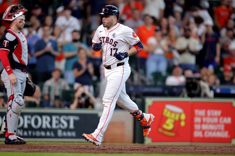 Jun 2, 2024; Houston, Texas, USA; Houston Astros catcher Victor Caratini (17) crosses home plate after hitting a home run to right field against the Minnesota Twins during the second inning during the second inning at Minute Maid Park. Mandatory Credit: Erik Williams-USA TODAY Sports