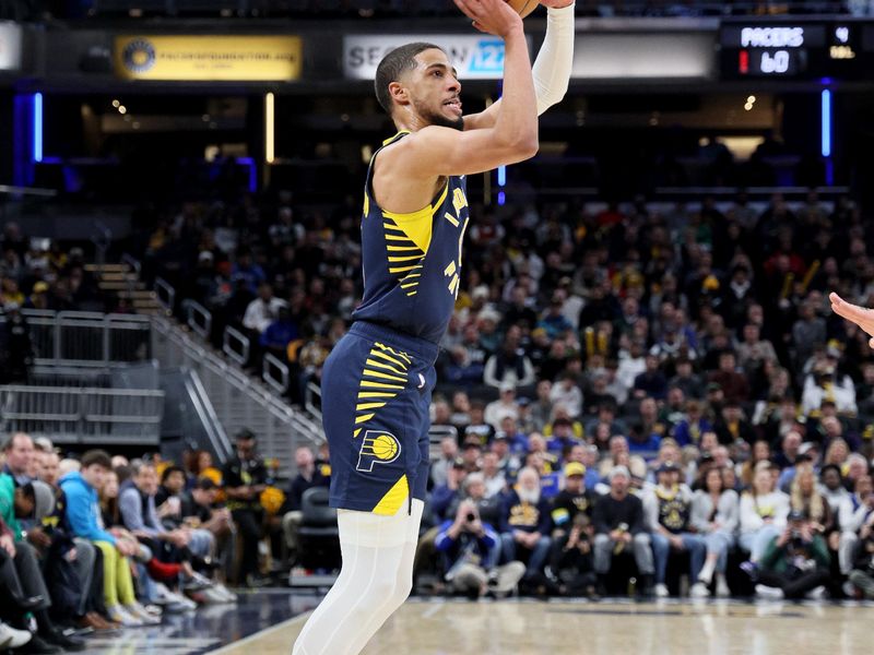 INDIANAPOLIS, INDIANA - JANUARY 03: Tyrese Haliburton #0 of the Indiana Pacers shoots the ball against the Milwaukee Bucks  at Gainbridge Fieldhouse on January 03, 2024 in Indianapolis, Indiana.    NOTE TO USER: User expressly acknowledges and agrees that, by downloading and or using this photograph, User is consenting to the terms and conditions of the Getty Images License Agreement.  (Photo by Andy Lyons/Getty Images)