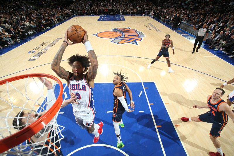 NEW YORK, NY - MARCH 12:  Kelly Oubre Jr. #9 of the Philadelphia 76ers dunks the ball during the game against the New York Knicks on March 12, 2024 at Madison Square Garden in New York City, New York.  NOTE TO USER: User expressly acknowledges and agrees that, by downloading and or using this photograph, User is consenting to the terms and conditions of the Getty Images License Agreement. Mandatory Copyright Notice: Copyright 2024 NBAE  (Photo by Nathaniel S. Butler/NBAE via Getty Images)