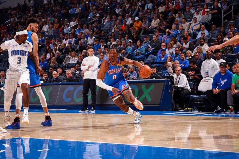 OKLAHOMA CITY, OK - NOVEMBER 4:  Jalen Williams #8 of the Oklahoma City Thunder dribbles the ball during the game against the Orlando Magic on November 4, 2024 at Paycom Center in Oklahoma City, Oklahoma. NOTE TO USER: User expressly acknowledges and agrees that, by downloading and or using this photograph, User is consenting to the terms and conditions of the Getty Images License Agreement. Mandatory Copyright Notice: Copyright 2024 NBAE (Photo by Zach Beeker/NBAE via Getty Images)