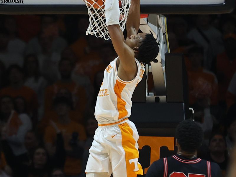 Jan 15, 2025; Knoxville, Tennessee, USA; Tennessee Volunteers guard Jordan Gainey (11) dunks against the Georgia Bulldogs during the second half at Thompson-Boling Arena at Food City Center. Mandatory Credit: Randy Sartin-Imagn Images