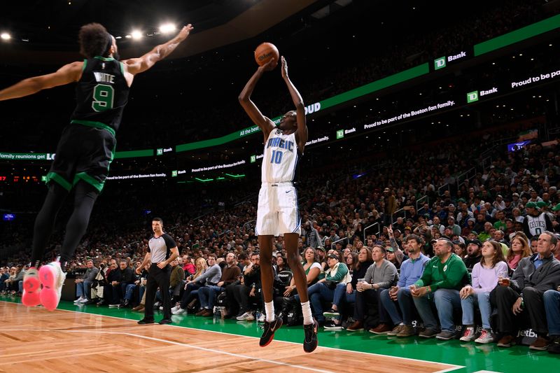 BOSTON, MA - DECEMBER 16: Bol Bol #10 of the Orlando Magic shoots the ball during the game against the Boston Celtics on December 16, 2022 at the TD Garden in Boston, Massachusetts.  NOTE TO USER: User expressly acknowledges and agrees that, by downloading and or using this photograph, User is consenting to the terms and conditions of the Getty Images License Agreement. Mandatory Copyright Notice: Copyright 2022 NBAE  (Photo by Brian Babineau/NBAE via Getty Images)