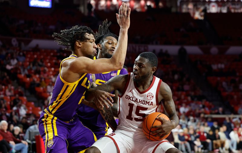 Feb 15, 2025; Norman, Oklahoma, USA; Oklahoma Sooners guard Duke Miles (15) drives to the basket against the Oklahoma Sooners during the second half at Lloyd Noble Center. Mandatory Credit: Alonzo Adams-Imagn Images