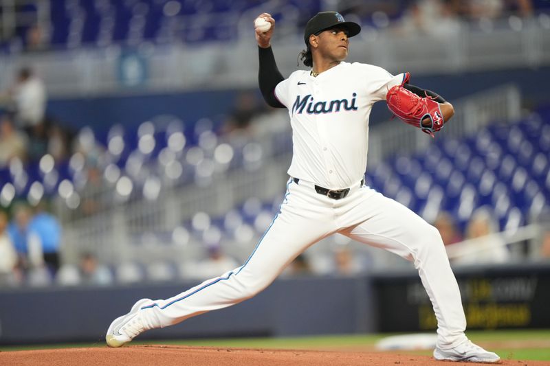 May 2, 2024; Miami, Florida, USA;  Miami Marlins starting pitcher Edward Cabrera (27) pitches in the first inning against the Colorado Rockies at loanDepot Park. Mandatory Credit: Jim Rassol-USA TODAY Sports