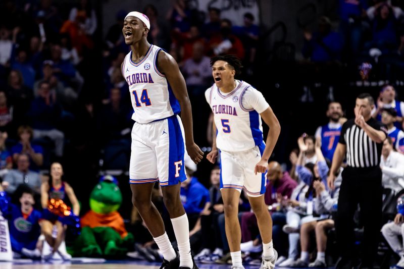 Jan 7, 2023; Gainesville, Florida, USA; Florida Gators guard Kowacie Reeves (14) reacts after making a three pointer during the first half against the Georgia Bulldogs at Exactech Arena at the Stephen C. O'Connell Center. Mandatory Credit: Matt Pendleton-USA TODAY Sports