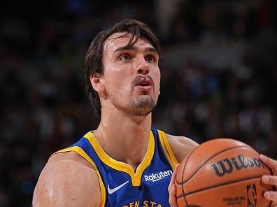 DENVER, CO - DECEMBER 25: Dario Saric #20 of the Golden State Warriors shoots a free throw during the game against the Denver Nuggets on December 25, 2023 at the Ball Arena in Denver, Colorado. NOTE TO USER: User expressly acknowledges and agrees that, by downloading and/or using this Photograph, user is consenting to the terms and conditions of the Getty Images License Agreement. Mandatory Copyright Notice: Copyright 2023 NBAE (Photo by Bart Young/NBAE via Getty Images)