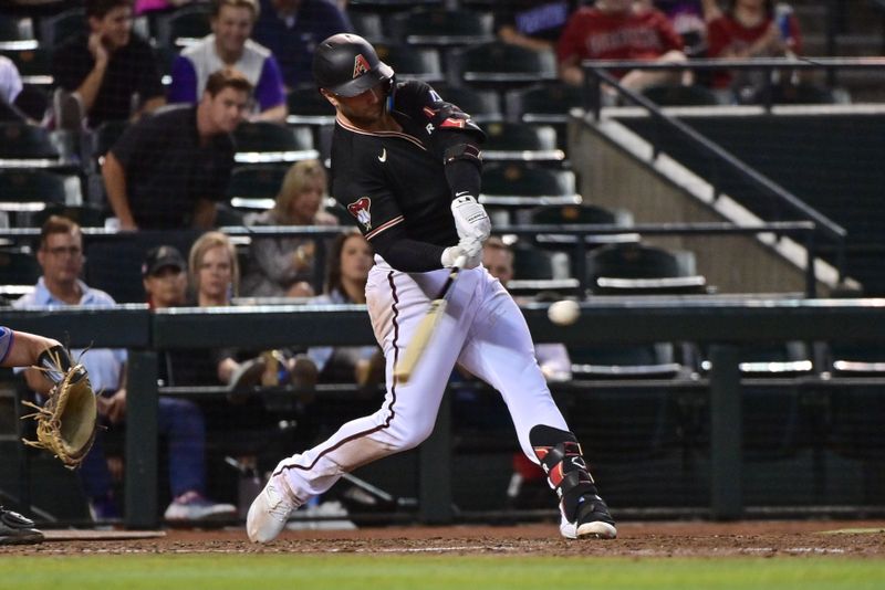 May 8, 2023; Phoenix, Arizona, USA;  Arizona Diamondbacks first baseman Christian Walker (53) hits a solo home run in the sixth inning against the Miami Marlins at Chase Field. Mandatory Credit: Matt Kartozian-USA TODAY Sports